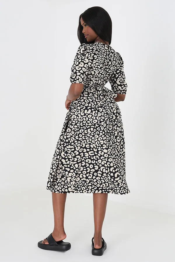 ANIMAL PRINT MIDI WRAP DRESS WITH THREE QUARTER SLEEVES