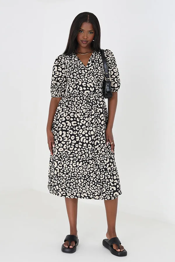 ANIMAL PRINT MIDI WRAP DRESS WITH THREE QUARTER SLEEVES